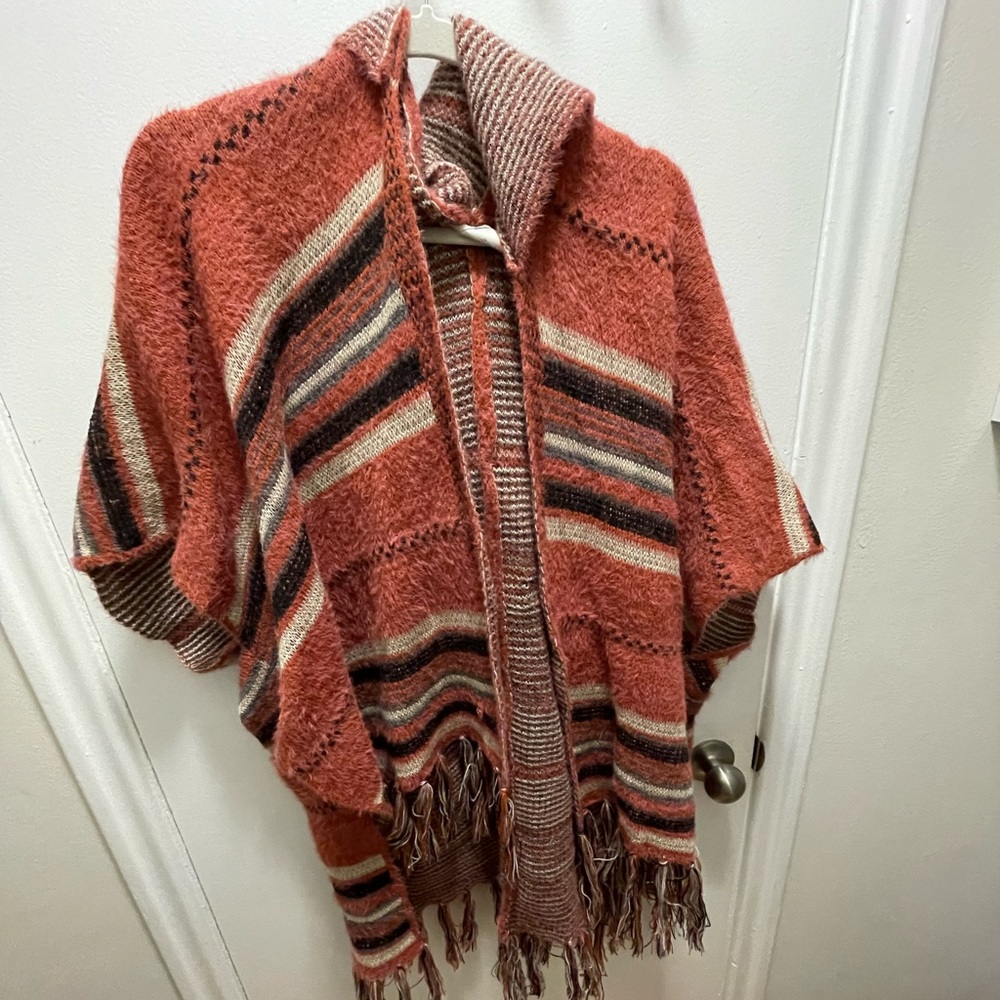 Francesca’s colourful hooded poncho